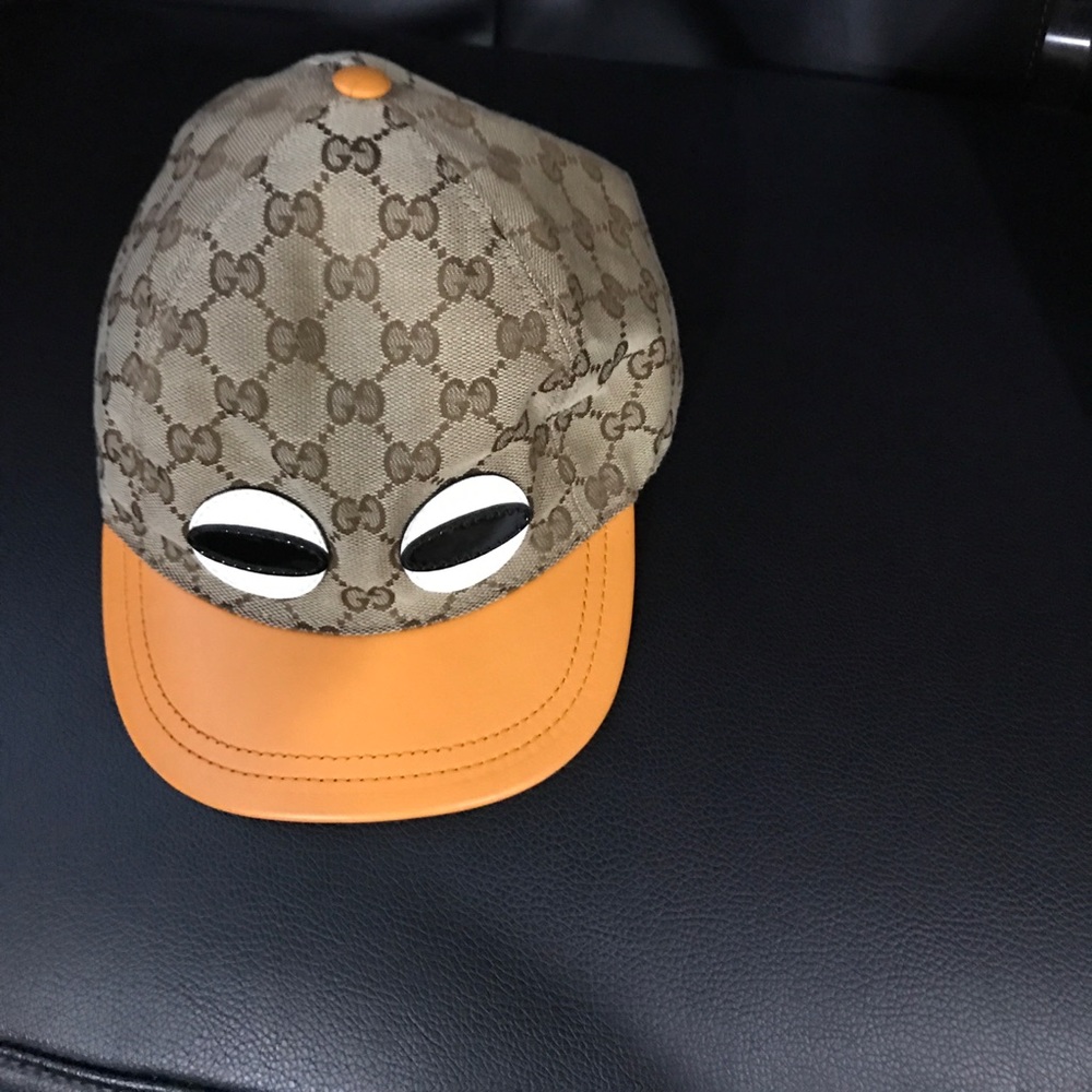 Gucci Kids Beige Monogram Cap with Orange Brim and Eye Patch Details
